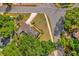 Overhead aerial view of home featuring mature trees, landscaping, and a backyard patio area at 1145 Utah Blvd, Orlando, FL 32803