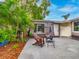 Backyard patio with outdoor seating and lush landscaping, creating a relaxing outdoor living space at 1145 Utah Blvd, Orlando, FL 32803