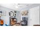 Cozy bedroom with decorative furnishings, hardwood floors, and plenty of natural light at 1145 Utah Blvd, Orlando, FL 32803