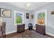 Cozy bedroom with hardwood floors, decorative furnishings, and plenty of natural light at 1145 Utah Blvd, Orlando, FL 32803