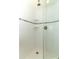 Modern bathroom shower with white subway tile and a sleek glass enclosure at 1312 7Th St, St Cloud, FL 34769