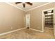 Inviting bedroom with plush carpet and a door leading to a closet area at 1312 7Th St, St Cloud, FL 34769