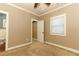 Bedroom has a standard window and a door leading to a closet at 1312 7Th St, St Cloud, FL 34769