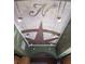 Unique ceiling design with custom artwork and lighting fixtures at 1312 7Th St, St Cloud, FL 34769