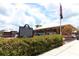 Exterior view of Sugar Belt Railway/VFW Post with an American flag blowing in the wind at 1312 7Th St, St Cloud, FL 34769