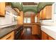 Well-lit kitchen boasting a gas range, granite countertops, and bright white subway tile backsplash at 1312 7Th St, St Cloud, FL 34769