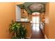 Bright kitchen with stainless appliances, wood cabinets and artistic ceiling at 1312 7Th St, St Cloud, FL 34769