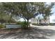 Lakefront Park building sign with mature trees and landscaping at 1312 7Th St, St Cloud, FL 34769