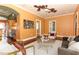 Bright living room featuring hardwood floors, modern furniture, and an open layout at 1312 7Th St, St Cloud, FL 34769