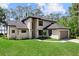 Stylish two-story home with a well-kept lawn and an attached two-car garage at 13562 S Lake Mary Jane Rd, Orlando, FL 32832