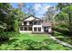 Beautifully landscaped two-story home with a spacious deck and a well-maintained lawn at 13562 S Lake Mary Jane Rd, Orlando, FL 32832