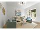 Comfortable living room filled with natural light and stylish neutral furniture at 13562 S Lake Mary Jane Rd, Orlando, FL 32832