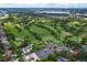 Scenic aerial view of a lush golf course community with mature trees and well-manicured greens at 236 N Ranger Blvd, Winter Park, FL 32792