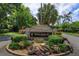 Elegant stone entrance sign for Winter Park Pines, surrounded by lush landscaping and greenery at 236 N Ranger Blvd, Winter Park, FL 32792