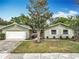 Charming single-story home featuring a well-manicured lawn and inviting front entrance at 236 N Ranger Blvd, Winter Park, FL 32792