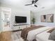 Serene bedroom with a warm color palette and seamless access to the vanity room at 236 N Ranger Blvd, Winter Park, FL 32792