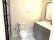 Renovated bathroom featuring a gray vanity and glass shower door at 604 Kenwick Cir # 105, Casselberry, FL 32707