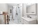 Modern bathroom featuring a glass shower, stylish fixtures, and a vanity with marble countertop at 690 E Church St, Bartow, FL 33830