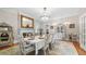 Formal dining room with chandelier, fireplace, and space for large gatherings at 690 E Church St, Bartow, FL 33830