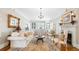 Bright living room with elegant furniture, a fireplace, and decorative molding at 690 E Church St, Bartow, FL 33830