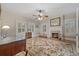 Office area features a fireplace, large rug, and plenty of natural light at 690 E Church St, Bartow, FL 33830
