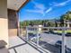 Apartment balcony overlooking a parking lot at 7672 Amazonas St, Kissimmee, FL 34747
