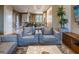 Open-concept living room with stylish furniture and natural lighting at 7672 Amazonas St, Kissimmee, FL 34747