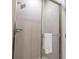 Modern shower is glass-enclosed and has a sleek rain style shower head at 7672 Amazonas St, Kissimmee, FL 34747