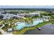 Resort style community featuring luxury pool, lake access, and meticulously landscaped grounds at 8044 Lost Shaker Ln, Kissimmee, FL 34747