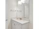 Bathroom featuring a white vanity with a light countertop and chrome fixtures at 8044 Lost Shaker Ln, Kissimmee, FL 34747