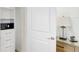 Organized closet space with shelves, drawers, and a built-in safe for storing valuables, with a bedside table at 8044 Lost Shaker Ln, Kissimmee, FL 34747