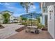 Patio featuring outdoor dining and lush landscaping at 8044 Lost Shaker Ln, Kissimmee, FL 34747
