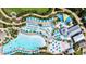 Overhead view of pool deck with cabanas, lounge chairs, umbrellas, and winding walkways in a resort setting at 8044 Lost Shaker Ln, Kissimmee, FL 34747