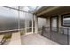 Enclosed patio with stone floors provides a versatile outdoor living space at 9312 Sommerset Hills Dr, Davenport, FL 33896