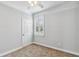 Bedroom featuring neutral walls, plush carpeting, and ample lighting at 1013 Maiden Ter, Celebration, FL 34747