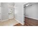 Welcoming foyer with tile flooring and a view of a room with hardwood floors at 1013 Maiden Ter, Celebration, FL 34747