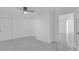 Bright bedroom features marble tile floors, a ceiling fan, and a light neutral paint scheme at 1030 Gran Paseo Dr, Orlando, FL 32825