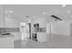 Spacious white kitchen with stainless appliances and open floor plan at 1030 Gran Paseo Dr, Orlando, FL 32825