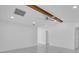 Bright, open living room with ceiling fan, wood beam, and recessed lighting at 1030 Gran Paseo Dr, Orlando, FL 32825