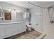 Bright bathroom with double vanity and updated shower at 1105 Mill Run Cir, Apopka, FL 32703