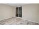 Bedroom with neutral walls, decorative tile flooring, and sliding glass doors at 1105 Mill Run Cir, Apopka, FL 32703