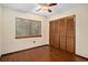 Bedroom features include wood floors, ceiling fan, window and closet at 1105 Mill Run Cir, Apopka, FL 32703