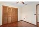 Bedroom features include wood floors, ceiling fan and closet at 1105 Mill Run Cir, Apopka, FL 32703