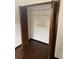 An open bedroom closet provides ample storage space featuring shelving and a hanging bar at 1105 Mill Run Cir, Apopka, FL 32703