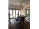 Inviting dining room area with large table, comfortable seating, ceiling fan, and natural light at 1105 Mill Run Cir, Apopka, FL 32703