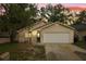 Charming single-Gathering home with a well-maintained lawn, and inviting front porch at 1105 Mill Run Cir, Apopka, FL 32703