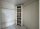 Walk-in closet with shelving for optimal storage solutions at 132 Acapulco Dr, Kissimmee, FL 34743