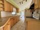 Kitchen featuring appliances, cabinets, and sink at 132 Acapulco Dr, Kissimmee, FL 34743