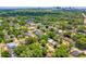 An aerial view of a lush neighborhood with single-Gathering homes near downtown at 1424 W New Hampshire St, Orlando, FL 32804
