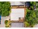 An aerial view of a well maintained home with lovely landscaping and outdoor seating at 1424 W New Hampshire St, Orlando, FL 32804